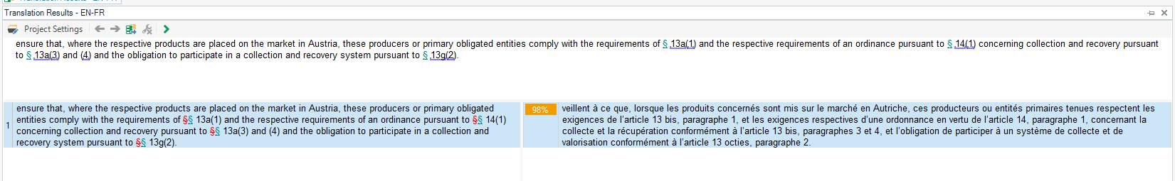 Screenshot of Trados Studio showing a translation segment with track changes highlighting the ampersand symbol as both deleted and added in the source text.