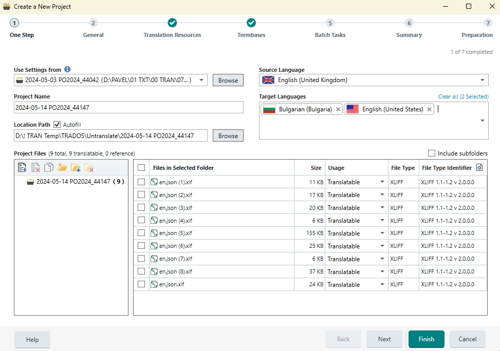 Trados Studio screenshot showing the 'Create a New Project' window with 'One Step' selected. Source language set to English (United Kingdom) and target languages include Bulgarian (Bulgaria) and English (United States). Nine project files listed as translatable with file type XLIFF.