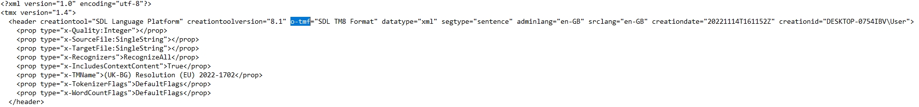 Screenshot of an XML file opened in a text editor showing header information for a Trados Studio file, including creation tool, file format, and properties like source and target file, quality, and word count flags.