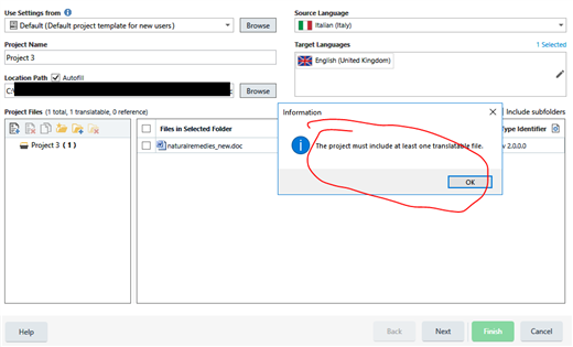 Trados Studio information dialog box stating 'The project must include at least one translatable file.' with an OK button.