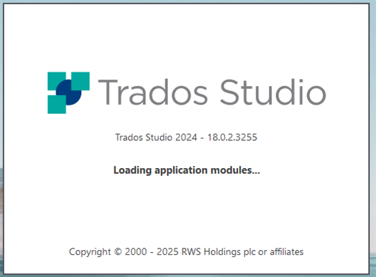 Initial loading screen of Trados Studio 2024 version 18.0.2.3255 displaying the message 'Loading application modules...'