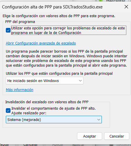 High DPI settings window for SDLTradosStudio.exe, showing options to fix scaling issues, use system settings, and override high DPI behavior.