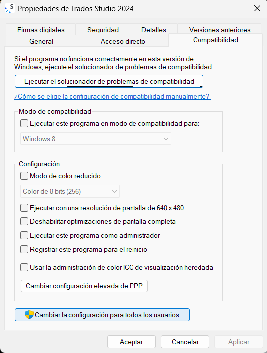 Compatibility settings window for Trados Studio 2024, showing options like compatibility mode for Windows 8, reduced color mode, and high DPI settings.