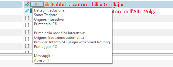 Translation details pop-up in Trados Studio indicating the segment is translated, with a warning symbol and a message alert.