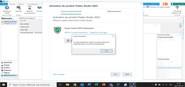 Popup message over the Trados Studio activation window displaying an activation code and stating it's already used on another machine.