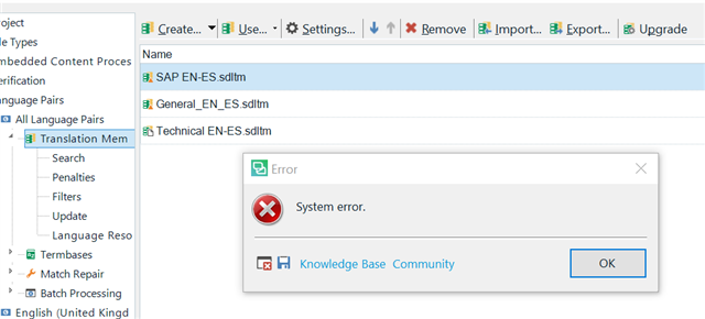 Trados Studio error dialog box displaying 'System error.' with options for Knowledge Base and Community.