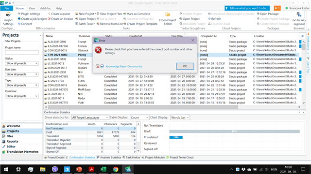 Error message in Trados Studio 2021 stating 'Please check that you have entered the correct port number and other settings' with an 'OK' button, displayed over the main project list interface.