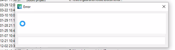 Screenshot of Trados Studio displaying an empty error message box with a loading circle, indicating the program is hanging.