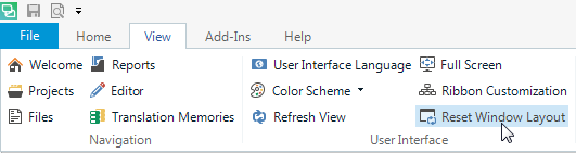Trados Studio interface showing the 'View' tab with an arrow pointing to 'Reset Window Layout' option.