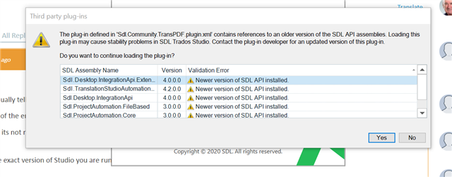 Error message in Trados Studio 2021 showing a plugin compatibility issue with 'Sdl.Community.StarTransit' referencing older SDL API versions, prompting whether to continue loading the plugin.