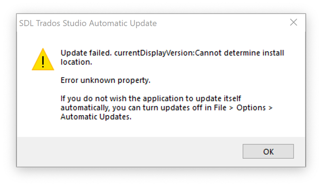 SDL Trados Studio Automatic Update error message window showing 'Update failed. currentDisplayVersion: Cannot determine install location. Error unknown property.' with a yellow warning icon.