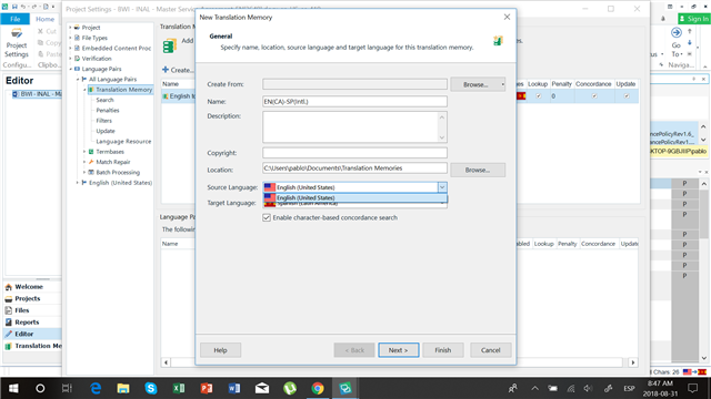 Trados Studio 'New Translation Memory' creation window with fields for TM name, location, and language pair selection stuck on English (United States) and Spanish (United States).