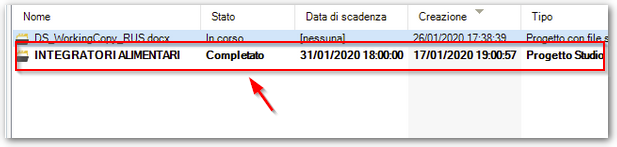 Screenshot of Trados Studio project list highlighting a finalized file named INTEGRATORI ALIMENTARI with a red arrow pointing to it.