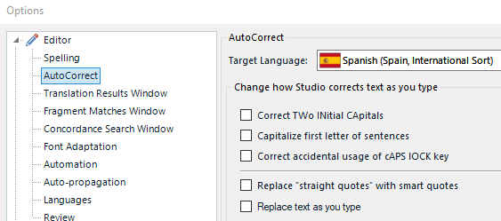 Screenshot of Trados Studio AutoCorrect options with 'Correct Two Initial Capitals' checked for Spanish (Spain, International Sort) language.