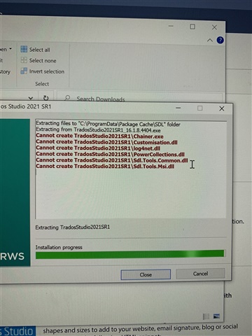 Screenshot of Trados Studio installation error, with multiple 'Cannot create file' messages for various .dll files, indicating a potential write permission issue.
