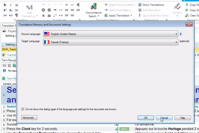 Screenshot of Trados Studio's Project Settings window showing source language as English (United States) and target language as French (France) with unresponsive 'Advanced' and 'OK' buttons.
