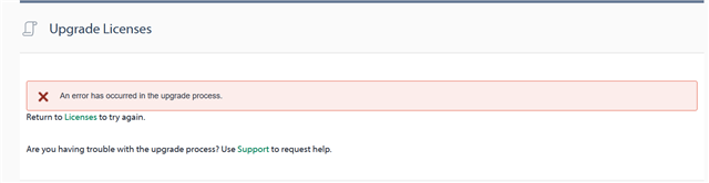 Trados Studio Upgrade Licenses screen with an error message stating 'An error has occurred in the upgrade process.' and a link to return to Licenses to try again.