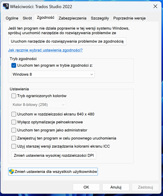 Compatibility settings window for Trados Studio 2022 showing 'Run this program in compatibility mode for: Windows 8' selected.