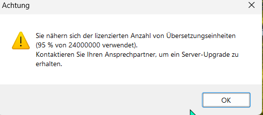 Warning message in Trados Studio stating 'You are approaching the licensed number of translation units (95% of 24000000 used). Contact your contact person to obtain a server upgrade.' with an OK button.