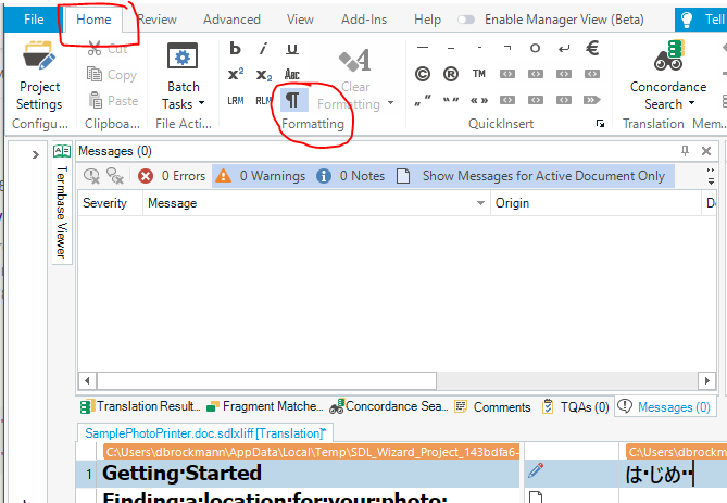 Trados Studio screenshot showing the Home tab with the 'Show whitespace characters' feature circled, indicating how to enable it. No errors or warnings are visible.