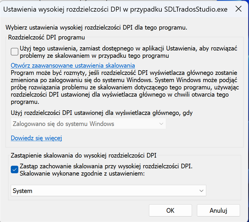 High DPI settings window for SDLTradosStudio.exe with 'Override high DPI scaling behavior' checked and scaling performed by 'System'.