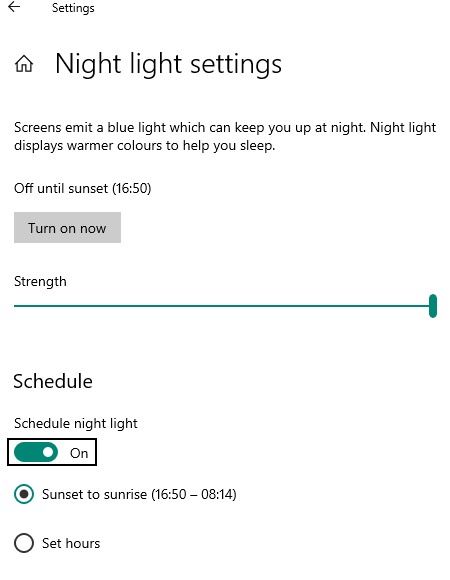 Screenshot of Windows Night Light settings with options to turn on now, adjust strength, and schedule from sunset to sunrise.