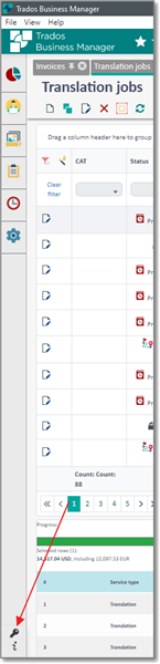 Trados Business Manager interface showing a list of translation jobs with a red arrow pointing to a key icon at the bottom left corner.