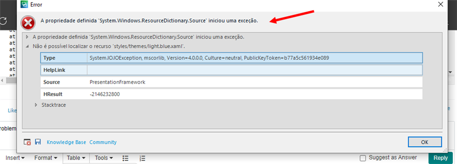 Error dialog box in Trados Studio on Windows 10 showing a System.IO.IOException with details about the exception and a red arrow pointing to the error message.