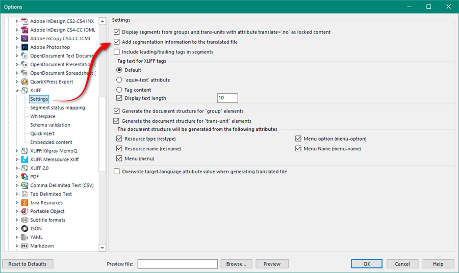 Trados Studio Options dialog box with a red arrow pointing to 'Include leadingtrailing tags in segments' option under XLIFF settings.
