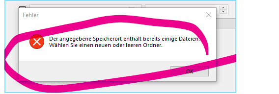 Error message in Trados Studio stating 'The specified storage already contains some files. Choose a new or empty folder.' with an OK button.