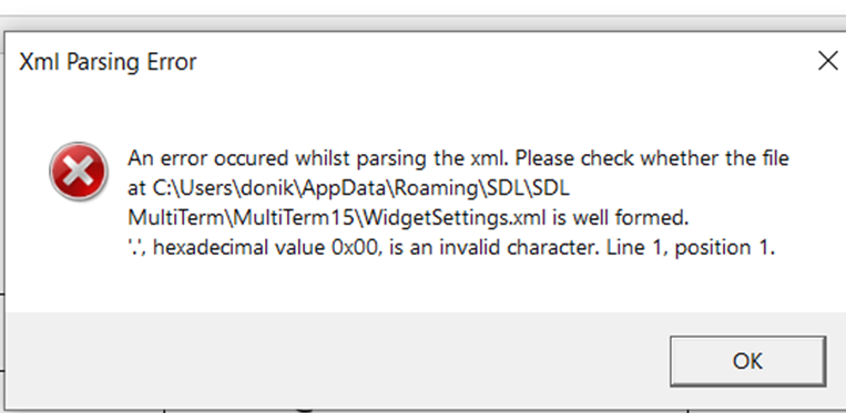 Error message in Trados Studio stating 'Xml Parsing Error' with details about an issue with the file at a specified file path indicating a hexadecimal value 0x00 is an invalid character.