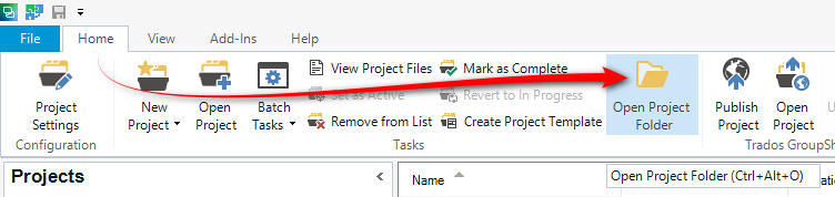Trados Studio interface showing the 'Open Project Folder' icon highlighted with a red arrow.