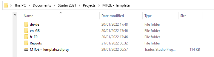 Windows Explorer window displaying folders for different languages and a Trados Studio project file within the 'MTQE - Template' project directory.