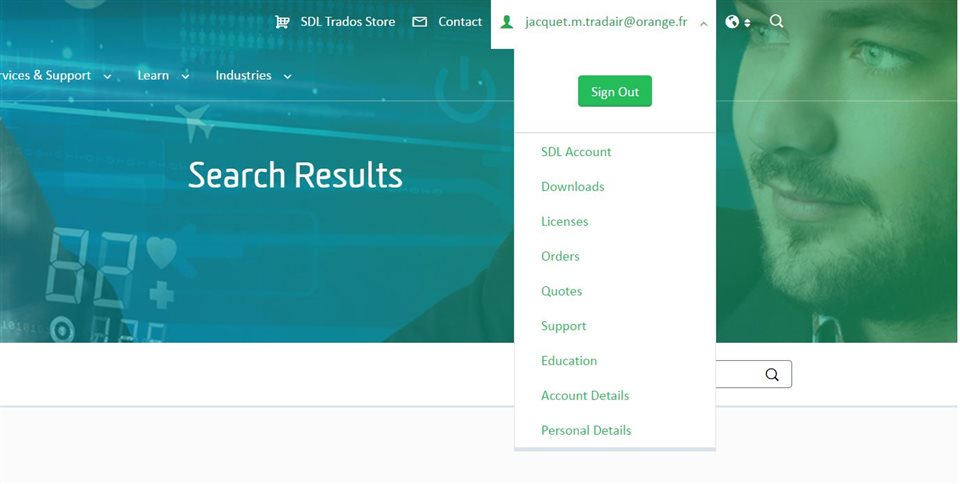 Screenshot of SDL Trados Store webpage with a 'Search Results' banner, showing dropdown menu under user account with options like Downloads, Licenses, Orders, and Support.