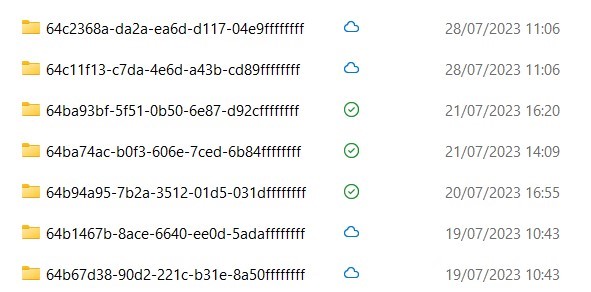 Screenshot of Trados Studio 2022 project list with various projects showing unique alphanumeric identifiers, dates, and times. Some projects have a blue circle with a checkmark indicating completion.